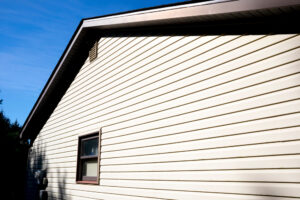 House With Pale Yellow Vinyl Siding House With Pale Yellow Vinyl Siding
